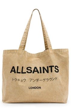 Bring a bit of brand love on your daily errands with an all-cotton washed denim tote that boasts plenty of logo cred. 100% cotton Spot clean Imported Casual Logo Bags For Spring, Beige Cotton Bag With Logo, Beige Cotton Bags With Logo, Casual Beige Bag With Logo, Casual Distressed Bags For Daily Use, Casual Summer Bags With Logo, Everyday Cotton Bags With Logo, Casual Tote Bag With Logo Print, Spring Cotton Bags With Letter Print