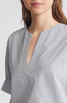 Elbow-length sleeves frame this organic-cotton poplin blouse covered in stripes and topped with a classic split neckline. 24 1/2" length (size Medium) Split neck Elbow-length sleeves 100% organic cotton Dry clean or machine wash, dry flat Imported Poplin Blouse, Elbow Length Sleeve, Cotton Poplin, Top Brands, Split, Organic Cotton, Dry Clean, Stripes, Nordstrom