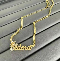 --Bling Gold Name Necklace,Custom Name Necklace,Name Necklace Gold,Cuban Chain Necklace,Name Plate Necklace,Personalized Necklace Women Men The most unique jewelry you can find, a perfect gift for your friend, family, or for yourself.  ❤️ Made and shipped from the USA ❤️ NO FADE / NONTARNISH / WATERPROOF ❤️ High-quality materials and attention to detail ❤️Color: Silver, Gold, Rose Gold ❤️ Our Process time is about 5 - 10 business days upon ordering.         The Transportation time is 4-7 Days. E Personalized Cuban Link Necklaces For Gift, Personalized Cuban Link Necklace As Gift, Personalized Cuban Link Necklace For Gift, Gold Cuban Link Name Necklace, Metal Pendant Necklace With Name, Unique Personalized Gold Necklaces, Personalized Gold Chain Necklace, Customized Gold Cuban Link Necklaces, Customized Gold Cuban Link Jewelry