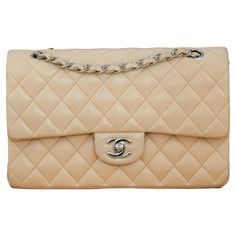 Brand Chanel Model Timeless Serial No. 13****** Color Beige Date Approx. 2010 Metal Silver Material Lambskin Measurements Approx. 15 x 25 x 6 cm Condition Excellent Comes with Chanel Dust bag and authentic Card If you are interested in any of our previously sold pieces, please contact us and we will do our best to source another one. Chanel Beige, Chanel Shoulder Bag, Chanel Model, Silver Material, Flap Bag, Lambskin Leather, Fashion Handbags, Chanel Classic, Leather Bag