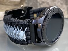 "FREE USPS PRIORITY MAIL SHIPPING FOR DOMESTIC US ORDERS (Includes U.S. Military APO/FPO Address Overseas) Thank you for visiting our shop \"Cording 2U\". A veteran owned business. Handcrafted Paracord wearables customized \"According To You\". Handcrafted with 100% Nylon Paracord \"MADE IN USA\" Our Products include: 🔹Custom handcrafted watch bands according to your wrist size, style, and color of choice. If you don't see it in our page yet, please contact us and we can discuss your options. ? Adjustable Silver Watch Bands For Outdoor Use, Silver Durable Watch Bands For Outdoor, Durable Silver Watch Bands For Outdoor, Outdoor Durable Silver Watch Bands, Silver Watch Band With Bracelet Strap For Outdoor, Silver Bracelet Strap Watch Band For Outdoor, Adjustable Wear-resistant Functional Watch Bands, Black Paracord Watch Accessories For Outdoor, Galaxy Watch 4 Bands