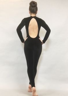 Introducing "Black Cat" – a captivating bodysuit costume tailored for dancers and circus performers.Fabric:Experience the allure of high-quality velvet Lycra with 4-way stretch – firm, flexible, and non slippery. Available in a variety of colors.Design:Immerse yourself in the sleekness of this velvet bodysuit featuring long sleeves , 1” scoop neck with snap button on the back of the neck. The open back adds an extra touch of elegance.Customization:Ready for a personalized touch? Contact me for a Cat Dance Costume, Fitted Black Leotard For Party, Fitted Black Dance Leotard, Black Fitted Dance Leotard, Fitted Backless Leotard For Party, Fitted Backless Party Leotard, Elegant Stretch Leotard For Party, Black Fitted Unitard For Costume Party, Fitted Black Unitard For Costume Party