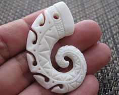 This amazing Octopus is carved by one of the best Balinese artisan in Indonesia. It has extremely fine detail measuring approx 48mm x 30mm Thank you for visiting and please feel free to convo me if you have any questions Unique Carved Bone Jewelry, Unique Bone-colored Carved Jewelry, Carving Jewelry, Octopus Pendant, Bone Art, Maori Art, Carved Bone, Bone Horn, Bone Carving