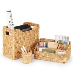 two wicker baskets filled with books and magazines