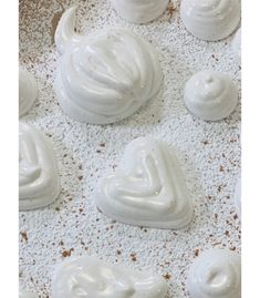 some white icing sitting on top of a table