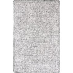 a white rug with small squares on the bottom, and black dots in the middle