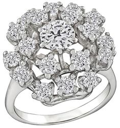 This beautiful 14k white gold ring is set with sparkling round cut diamonds that weigh approximately 2.20ct. graded G color with VS clarity. The top of the ring measures 18mm in diameter. It is currently size 8 1/4, and can easily be resized. Inventory #12593PWSS Diamond Cocktail Ring, Diamond Crown, Gold Cocktail Ring, Gold Cocktail, Diamond Cocktail Rings, Diamond Charm, 14k White Gold Ring, Diamond Cluster Ring, White Gold Ring