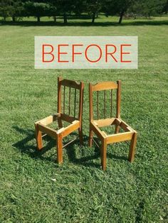 two wooden chairs sitting on top of a grass covered field next to eachother