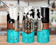 three personalized tumbles with monogrammed cow print and turquoise marbled finish