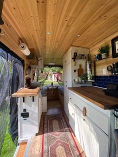 the interior of an rv is clean and ready to be used as a camper