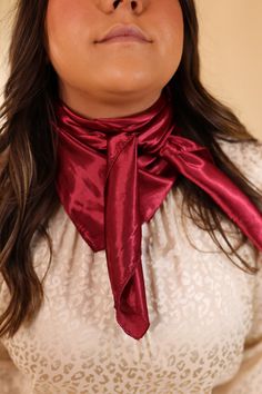 Expertly crafted from a high-quality, soft-to-the-touch fabric, you'll love the elegant sophistication this Solid Colored Scarf brings to your wardrobe. The perfect accessory for year-round style. Scarf measures 36 in x 36 in SKU: #Wynonna- Bula Burgundy Classic Adjustable Neckwear For Spring, Classic Spring Scarves For Formal Occasions, Elegant Formal Neckwear For Fall, Classic Formal Scarves For Spring, Elegant Red Scarf For Formal Occasions, Elegant Fitted Neckwear For Spring, Classic Spring Formal Scarves, Formal Solid Silk Scarves, Elegant Solid Color Adjustable Neckwear