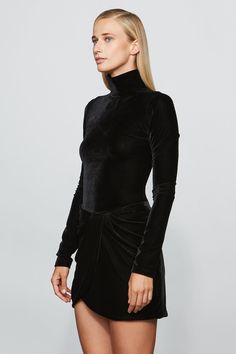 Easy to mix and match or wear as a set—the Kourtney fitted turtleneck in stretch velvet with a sleek back zip is the perfect pick for effortless holiday dressing and beyond. Sleek Back, Holiday Dressing, Fitted Turtleneck, Easy Dressing, Stretch Velvet, Mix N Match, Top Dress, Holiday Dresses, Mix And Match