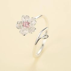 Love spring all year round with this playful and charming Cute Spiral Cherry Blossom Ring! The unique spiral design and delicate pink gem make it perfect for adding a touch of nature to any outfit. Don't wait for the cherry blossoms to bloom, bring them with you wherever you go! 🌸 Size: Resizable Description: Shape\Pattern: PlantOrigin: CN(Origin)Metals Type: SilverMain Stone: ZirconItem Weight: 2g Cherry Blossom Ring, Pink Zircon, Silver Rings For Women, Flower Rings, Cherry Flower, Flower Engagement Ring, Pink Gem, Rings Engagement, Pink Ring