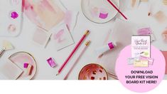 a table topped with lots of pink and white items next to a cup filled with watercolor