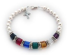 "The 6mm Square Faith or Salvation Bracelet™ is made with 6mm round sterling silver beads with a sterling silver lobster clasp (you can choose a lobster clasp) and a sterling silver cross charm. Let us know if you want to include the purple crystal or not. The Swarovski's are 6mm square. The salvation bracelet, which is also known as the gospel bracelet, witness bracelet, wordless bracelet, bible or gospel bracelet is a bracelet used as a tool of Christians. The bracelet consists of a series of Sterling Silver Bracelets With 8mm Beads For Gift, Sterling Silver 8mm Beads Bracelet As Gift, Classic Sterling Silver Bracelet With 8mm Beads Gift, Spiritual Sterling Silver Beaded Bracelets With Birthstone, Gospel Bracelet, Salvation Bracelet, Bracelet With Cross, Faith Bracelet, Church Crafts