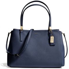 Coach Madison Christie Carryall Navy Blue Saffiano Leather Bag Coach-29422 -Saffiano Navy Blue Leather -Silver/Navy Blue - Satchel And Crossbody -Interior-4 Main Compartments, 2 Large Open Pockets With Magnetic Closures, And 2 Large Zip Pockets -Interior Small Zip Pockets And 3 Slip Pockets -Coach Exterior Hang Tags -Coach Logo On Front -Coach Logo On Clasps, Snaps, Hooks Dimensions: 15" (L) X 9 3/4" (H) X 43/4" (W) Handles Drop:8” Strap Drop-20”-22” Condition: Very Good Condition. The Corners S Formal Blue Coach Satchel, Navy Coach Bag, Coach Blue Satchel With Handles, Blue Coach Bag With Double Handle, Blue Coach Bag With Zipper Closure, Coach Logo, Garment Bags, Leather Silver, Rain And Snow Boots