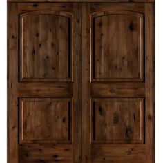 the double doors are made from wood and have two sidelights on each side,