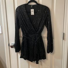 This Is The Cutest Outfit. Faux Wrap Top With Tons Of Black Sequins. Elastic Waist With Tie. Bottom Is Shorts. The Body Of The Outfit Is Lined, Long Sleeves Are Sheer And Sequined. Elastic Cuff On Sleeves. New With Tags! Black Sparkly Romper, Sparkly Romper, Gold Lace Dresses, Navy Blue Mini Dress, Black Sequin Mini Dress, Tulle Skirt Black, Beautiful Red Dresses, Faux Wrap Top, Wrap Shorts