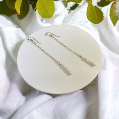 The Emma- 💙14k Gold Filled Ball Hook 💙14k Dainty Cable Chain 💙3inch Drop 💙6 Tiny, Dainty Freshwater Pearls Why choose Gold Filled?  Gold filled jewelry contains about 100 times the amount of gold than a gold plated item. The gold is fused to the base metal using pressure and high heat so it will never flake or peel. Gold filled products will not tarnish under normal circumstances. If necessary, you can clean the necklace gently with a soft cloth. Keep harsh chemicals away such as sunscreens, lotions, perfumes, soaps etc. Gift Tarnish Resistant Linear Earrings, Hallmarked Drop Earrings For Everyday Wear, Hypoallergenic Gold Linear Earrings In Sterling Silver, Everyday Hallmarked Drop Earrings, Everyday Silver Earrings In 14k Gold, Hypoallergenic 14k White Gold Filled Jewelry, Everyday Silver 14k Gold Earrings, Nickel-free Silver Earrings In 14k Gold, Nickel-free Silver 14k Gold Earrings