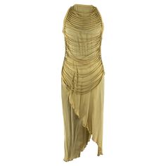 A Jean Claude Jitrois chiffon taupe maxi dress with a layer of beige leather fringing draped perpendicular across the bodice. The dress is sleeveless and features a curved wrap in the front. The dress is fastened down the centre back with a zip. Taupe Maxi Dress, Black Leather Jeans, Fem Fashion, Sheer Dresses, Dream Wishlist, Floral Evening Dresses, Maria Callas, Chiffon Wrap, Beige Dress