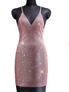 Rhinestone see through sparkling dress. SIZE Bust: 31-43” Waist: 31-39” Length:32” Pink Embellished V-neck Sequin Dress, Glamorous Pink Club Dress, Pink Embellished Club Dress, Pink Embellished Backless Mini Dress, Glamorous Pink Bodycon Dress For Prom Season, Mini Dress With Rhinestones For Homecoming, Glamorous Pink Bodycon Dress For Prom, Mesh Dress With Rhinestones For Party Season, Homecoming Mini Dress With Rhinestones For Party Season