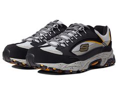 SKECHERS Work Stamina Steel Toe - Men's Shoes : Black/Gray : These SKECHERS Work Stamina Steel Toe shoes keep you safe from any electric hazards. Steel toe rated ASTM F2412-2011 I/75 C/75 protection and meets ASTM F2413-2011 Electrical Hazard (EH) safety standards. Leather and textile upper. Textile lining. Synthetic memory foam, removable footbed. Steel toe. Lace-up closure. Synthetic outsole meets ASTM F2913 Slip Resistant Safety Standards under Wet/Dry conditions only. Imported. Measurements: Shock Resistant Low-top Sneakers For Safety, Sports Sneakers With Reinforced Toe, Steel Toe Lace-up Safety Sneakers, Low-top Sports Sneakers With Reinforced Toe, Steel Toe Safety Sneakers Lace-up, Safety Sneakers With Steel Toe And Round Toe, Black Steel Toe Sneakers For Safety, Functional Steel Toe Sneakers For Sports, Black Steel Toe Safety Sneakers