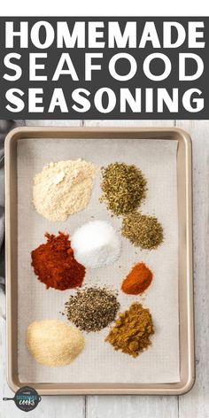 the ingredients for homemade seafood seasoning on a baking sheet with text overlay that says homemade seafood seasoning