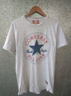 ITEM : Vintage Converse t shirt spell out TAG : Converse Made in Usa Single stitch MEASUREMENT : (taken while garment is laying flat) - Width (Armpit to armpit) : 19" Inches - Length (Shoulder to the end of garment) : 29" Inches CONDITION : - Condition used 9/10 good Nice design a bit stain at the end of sleeve but not major issue (refer last picture) no holes ref40 SHIPPING: Shipping duration is vary depending on location..all item is shipping with tracking and usually will arrive within 10 - 21 working days PAYMENT: We accept PayPal only. The item will be sent within 3 days after payment is completed. I will describe as good as possible for my items. Please email me for any question and your telephone numbers for details and shipping process. Thanks so Much for your visited. Converse Shirt, Converse T Shirt, Vintage Converse, Nice Design, Mens Graphic Tee, Favorite Outfit, Made In Usa, Converse, Cool Designs