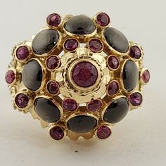 14 karat yellow gold Black Star Sapphires And Ruby Vintage dome Ring weighing 7.3 grams, size 6. This ring is 17 millimeter in diameter and 13 millimeter high. Antique Jewelry Rings, Dome Ring, Star Sapphire, Star Ruby, Domed Ring, Black Star, Vintage Ring, Every Girl, Vintage Watches