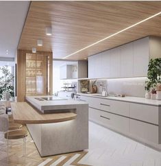 a modern kitchen with an island counter and wooden ceilinging is pictured in this rendering