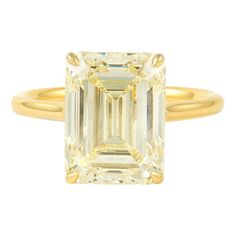 Stunning modern diamond solitaire ring. High jewelry by Alexander Beverly Hills HRD graded 6.02 carat emerald cut diamond, M color grade, and VS2 clarity grade. 18-karat yellow gold, current ring size 6.5. Accommodated with an up to date appraisal by a GIA G.G., please contact us with any questions. Thank you. HRD Report Number 180000169503 Item Number APC1112 Luxury Yellow Gold Emerald Cut Crystal Ring, Yellow Emerald Cut Diamond Ring, Modern Gia Certified Emerald Cut Diamond Ring, Yellow Gold Octagon Emerald Ring With Diamond, Octagon Emerald Ring With Diamond In Yellow Gold, Octagon Emerald Ring In Yellow Gold With Diamond, Yellow Solitaire Diamond Ring, Luxury Octagon Ring With Single Diamond, Octagon Yellow Gold Emerald Ring With Vvs Clarity