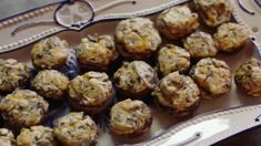 a tray filled with muffins on top of a table