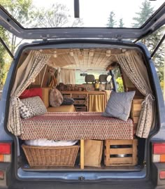 the back end of a van filled with furniture