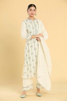 Off white three fourth sleeves A-line kurta with all over Damask bloom embroidery. Paired with a pant and a crushed dupatta. - Aza Fashions Off White Palazzo Set With Straight Kurta For Spring, White Palazzo Set With Dupatta For Spring, Off White Long Sleeve Kurta With Dupatta, White Palazzo Set With Dupatta, Long Sleeve, White Long Sleeve Palazzo Set With Dupatta, White Long Sleeve Palazzo Set For Festive Occasions, Cream Long Sleeve Kurta With Printed Motifs, White Palazzo Set With Printed Motifs, Off White Long Sleeve Palazzo Set For Eid