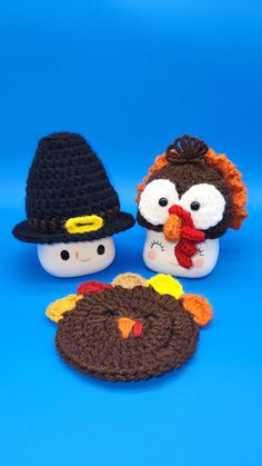 three crocheted thanksgiving turkeys with hats