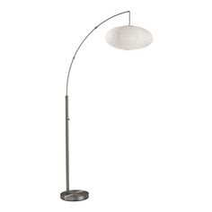 a floor lamp with a white shade on it's head and an oval base