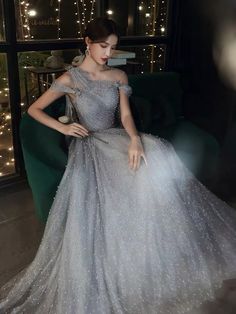 Elegant Gray Tulle Evening Dress, Gray Prom Evening Dress With Sweep Train, Gray Evening Dress With Sweep Train For Prom, Gray Sweep Train Evening Dress For Prom, Gray Sweep Train Prom Evening Dress, Gray Prom Evening Dress For Prom Season, Gray Evening Dress For Prom Season Banquet, Gray Evening Dress For Banquet And Prom Season, One Shoulder Tulle Evening Dress