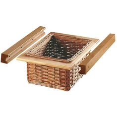 two baskets with wooden handles are sitting next to each other