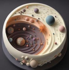 an image of a cake with different planets on the top and around it's surface