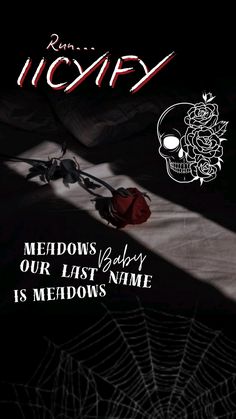 a black and white poster with a red rose in the center, next to a spider web