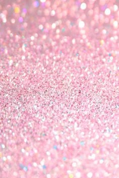 a close up view of some glitter on the ground with it's light shining