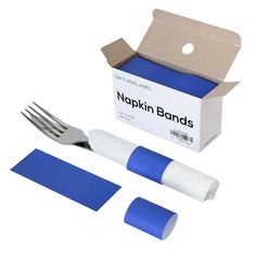 a fork, knife and two napkins in a box with blue tape around it