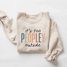 It's too peopley Sweatshirt, funny gift, funny sweatshirt, funny shirt, introvert sweatshir, funny gifts, gift for her, birthday gift How to Order 1* View all color and size charts before you place your order. 2* Select your shirt "SIZE" and "COLOR". 3* Click add to cart.  If you are ordering more than 1 item, you need to repeat this process for each item you wish to order. Product Information Gildan Hoodie- Sweatshirt 8 oz.(US) 13.3 oz.(CA), 50/50 preshrunk cotton/polyester Heather Sport colors: 60/40 polyester/cotton Air jet yarn = softer feel and reduced pilling Double needle stitching at shoulder, armhole, neck, waistband and cuffs 1 x 1 rib with spandex Quarter-turned to eliminate center crease Safety Green: Compliant with ANSI / ISEA 107 Tearaway label Washing Care Instructors Use co Trendy Funny Print Sweatshirt For Loungewear, Cute Sweatshirt With Funny Print And Crew Neck, Funny Text Relaxed Fit Sweatshirt, Trendy Relaxed Fit Sweatshirt With Funny Print, Cotton Sweatshirt With Funny Text, Funny Slogan Sweatshirt In Relaxed Fit, Trendy Crew Neck Sweatshirt With Funny Text, Funny Print Sweatshirt For Winter, Fun Sweatshirt With Funny Print Relaxed Fit