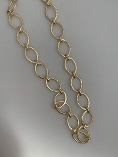 You get a 3 feet long Gold Finish And Silver Plated Solid Copper Pattern Marquise Shape Chain. This is copper chains with Gold Finish also available in Silver Plated. E-Coated Chain. The size of links are: 16mmX11mm All Over Marquise shape These chains are great for personal use or to design something for resale. You just need a hook/clasp to make a nice necklace! NOTE: All the sizes and descriptions are approximate for these fancy chains. Gold Oval Link Necklace, Oval Link Adjustable Chain Necklace For Jewelry Making, Bohemian Brass Chain Necklace With Adjustable Chain, Antique Gold Brass Chain Necklace With Adjustable Chain, Oval Link Metal Chain Necklace For Jewelry Making, Gold Oval Chain Necklace With Lobster Clasp, Gold-tone Brass Chain Necklace With Adjustable Chain, Gold-tone Chain Link Brass Jewelry, Luxury Gold-tone Brass Chain Necklace