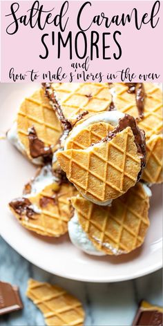 some waffles are on a white plate with chocolate and marshmallows