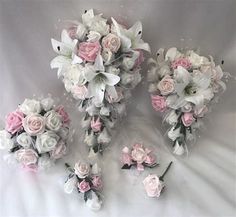 wedding bouquets with pink and white flowers are on display for $ 3 00 each