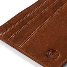 This slim, easy-to-carry card holder for men includes 6 card slots (3 on each side), a deep pocket on the top and 2 slip pockets on each side to hold folded cash. Constructed in vegetable-tanned light-brown/tan leather with a built-in lining to protect against RFID skimming. Delivered in a signature gift box. Designed in Denmark. Leather Card Holder, Card Holder Leather, Cambodia, Tan Leather, Light Brown, Denmark, Card Slots, Slots, Built In