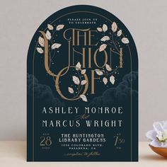 the union cafe wedding stationery is designed to look like an art deco - inspired arch