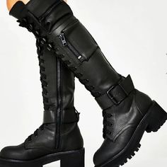 Introducing Techwear Boots – your must-have accessory for making a statement this season! Crafted with high quality materials and with a unique zipper design, these knee-high boots are the perfect combination of edgy fashion and modern style. Inspired by geek-chic goth aesthetics, these boots will bring an undeniable cool factor to your wardrobe. The chunky heel makes them comfortable to wear all day, while the pockets add a utilitarian touch that speaks to today’s trendsetters who want both for Techwear Boots, Knee High Combat Boots, Heel Combat Boots, Womens Thigh High Boots, High Boots For Women, Platform Combat Boots, Black Punks, Women Platform Shoes, Platform Heels Chunky