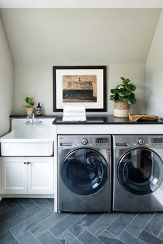 a washer and dryer in a small room